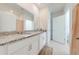 Bathroom with granite countertops, double sinks, and a separate shower at 2265 Tay Wes Dr, St Cloud, FL 34771