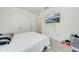 Bedroom with a queen bed, TV, and ample closet space at 2265 Tay Wes Dr, St Cloud, FL 34771