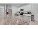 Modern kitchen with granite countertops and stainless steel appliances at 2265 Tay Wes Dr, St Cloud, FL 34771