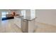 Kitchen island with granite countertop and stainless steel dishwasher at 2265 Tay Wes Dr, St Cloud, FL 34771