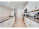 Modern kitchen with stainless steel appliances and granite countertops at 2265 Tay Wes Dr, St Cloud, FL 34771