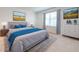 Main bedroom with a king-size bed, dresser, and large window at 2265 Tay Wes Dr, St Cloud, FL 34771
