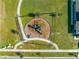 Community playground with playset and walking path at 2265 Tay Wes Dr, St Cloud, FL 34771