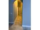 Tiled hallway featuring neutral paint and trim at 228 Remington Pl, Haines City, FL 33844
