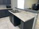 Kitchen featuring sink with bar height countertop at 228 Remington Pl, Haines City, FL 33844