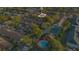 Aerial view of condo community with tennis court and pool at 2394 Sun Valley Cir # 2394, Winter Park, FL 32792