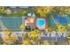 Community overview featuring tennis courts, pool, and parking at 2394 Sun Valley Cir # 2394, Winter Park, FL 32792