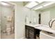 Clean bathroom with updated vanity and a shower stall at 2394 Sun Valley Cir # 2394, Winter Park, FL 32792