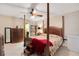 Spacious bedroom with a post bed and ample storage at 2394 Sun Valley Cir # 2394, Winter Park, FL 32792