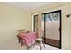 Cozy dining area with table and chairs near sliding doors at 2394 Sun Valley Cir # 2394, Winter Park, FL 32792