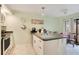 Well-equipped kitchen with island and stainless steel appliances at 2394 Sun Valley Cir # 2394, Winter Park, FL 32792
