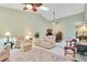 Open living area with vaulted ceiling and ample natural light at 2394 Sun Valley Cir # 2394, Winter Park, FL 32792