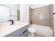 Bathroom with tub and gray vanity at 2571 Sw 153Rd Lane, Ocala, FL 34473