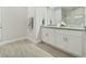 Bathroom with granite vanity and walk-in shower at 286 Begonia Ln, Kissimmee, FL 34759