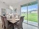 Dining room with sliding doors to backyard at 286 Begonia Ln, Kissimmee, FL 34759