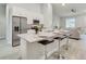 Modern kitchen with granite island and stainless steel appliances at 286 Begonia Ln, Kissimmee, FL 34759