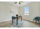 Home office with desk, chairs, and globe at 286 Begonia Ln, Kissimmee, FL 34759
