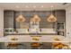 Contemporary kitchen with gray cabinets, white countertops, and island at 3000 Tohopekaliga Dr, St Cloud, FL 34772
