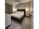 Bedroom with a king size bed, a ceiling fan, and tile flooring at 3180 Paradox Cir # 102, Kissimmee, FL 34746