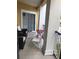 Relaxing balcony with patio furniture, offering a peaceful outdoor space at 3719 Conroy Rd # 2023, Orlando, FL 32839