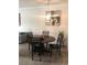 Bright dining area featuring a round table and four chairs at 3719 Conroy Rd # 2023, Orlando, FL 32839