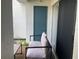 Small patio area with seating and a storage closet at 4149 S Semoran Blvd # 10, Orlando, FL 32822