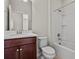 Bathroom with single vanity, toilet, and tub/shower combination at 418 Tortosa Ct, Davenport, FL 33837