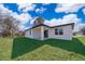 Covered patio and spacious grassy backyard at 4411 Sw 132Nd Pl, Ocala, FL 34473