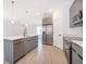 Modern kitchen with stainless steel appliances and an island at 4690 Sw 139Th Place, Ocala, FL 34473