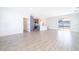 Open living room and kitchen with sliding glass doors at 4690 Sw 139Th Place, Ocala, FL 34473