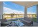 Relaxing balcony with outdoor seating and community views at 4731 Clock Tower Dr # 206, Kissimmee, FL 34746