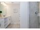 Clean bathroom with double vanity and shower at 4731 Clock Tower Dr # 206, Kissimmee, FL 34746