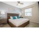Spacious bedroom with king-size bed and modern nightstands at 4731 Clock Tower Dr # 206, Kissimmee, FL 34746