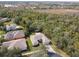 Community overview with houses and lush green surroundings at 554 Heartwell Dr, Kissimmee, FL 34759