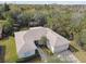 Single-story house with a two-car garage and manicured lawn at 554 Heartwell Dr, Kissimmee, FL 34759