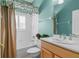 Light and airy bathroom with a tub and shower at 554 Heartwell Dr, Kissimmee, FL 34759