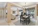 Bright dining area with access to the living room and screened patio at 554 Heartwell Dr, Kissimmee, FL 34759