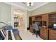 Home office with built-in desk and shelving at 554 Heartwell Dr, Kissimmee, FL 34759