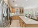 Spacious kitchen with large island and stainless steel appliances at 554 Heartwell Dr, Kissimmee, FL 34759