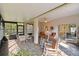 Spacious sunroom with plenty of seating and access to the backyard at 554 Heartwell Dr, Kissimmee, FL 34759