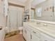 Clean bathroom with shower/tub combo and white vanity at 713 Green Ct, Kissimmee, FL 34759