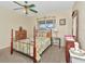 Bedroom with a double bed and wooden furniture at 713 Green Ct, Kissimmee, FL 34759
