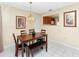 Cozy dining area with a view into the kitchen at 713 Green Ct, Kissimmee, FL 34759