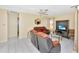 Comfortable living room with tiled floors and a view of the backyard at 713 Green Ct, Kissimmee, FL 34759