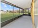Spacious screened porch overlooking the backyard at 713 Green Ct, Kissimmee, FL 34759