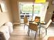 Breakfast nook with glass table and view of pool at 8417 Secret Key Cove, Kissimmee, FL 34747