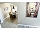 Elegant dining room with a large table and comfortable seating for six at 8417 Secret Key Cove, Kissimmee, FL 34747