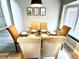 Bright dining area with a table and chairs, perfect for Gathering meals at 8417 Secret Key Cove, Kissimmee, FL 34747