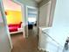 Upstairs hallway with access to bedrooms at 8417 Secret Key Cove, Kissimmee, FL 34747