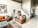 Living room with hardwood floors and access to other rooms in the house at 8417 Secret Key Cove, Kissimmee, FL 34747